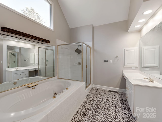 bathroom featuring independent shower and bath, tile patterned flooring, and vanity