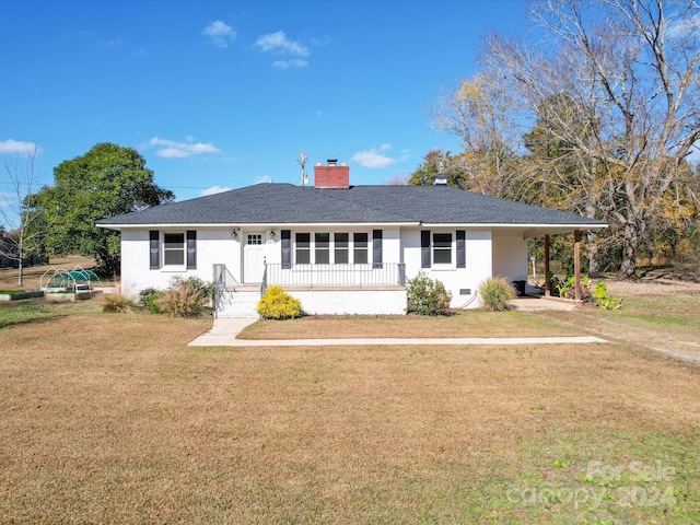 single story home featuring a porch and a front lawn