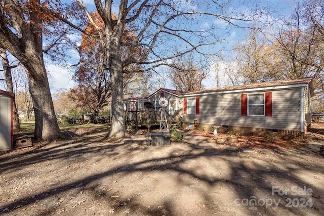 exterior space with a wooden deck