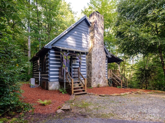 view of log cabin