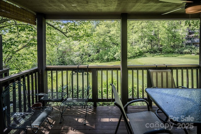 300 Glenwood Ln Unit K-38, Sugar Mountain, NC 28604 - wooden terrace with ceiling fan and a lawn