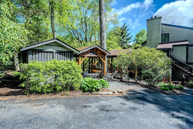 300 Glenwood Ln Unit K-38, Sugar Mountain, NC 28604 - view of front of home featuring a chimney and stairs