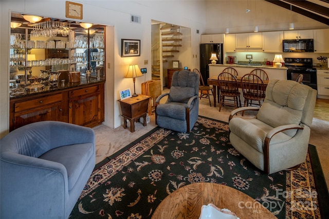 300 Glenwood Ln Unit K-38, Sugar Mountain, NC 28604 - carpeted living area featuring a sink and high vaulted ceiling