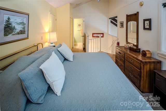 300 Glenwood Ln Unit K-38, Sugar Mountain, NC 28604 - carpeted bedroom with vaulted ceiling