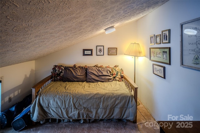 300 Glenwood Ln Unit K-38, Sugar Mountain, NC 28604 - carpeted bedroom featuring a textured ceiling and lofted ceiling