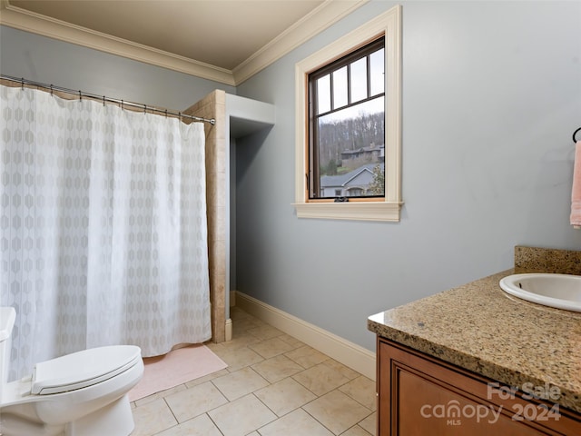 bathroom featuring walk in shower, tile patterned flooring, crown molding, toilet, and vanity