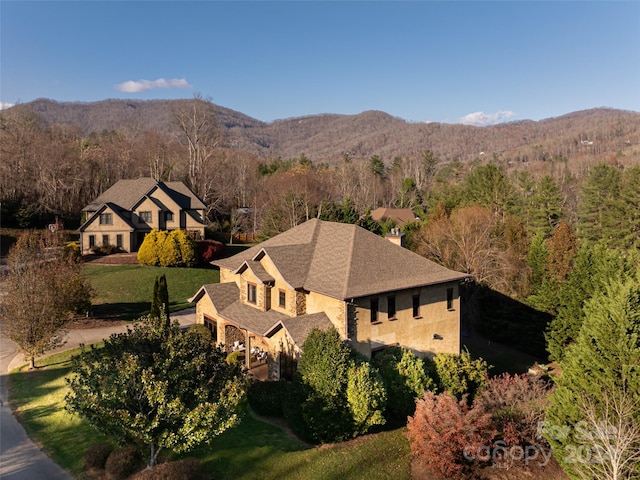 drone / aerial view featuring a mountain view