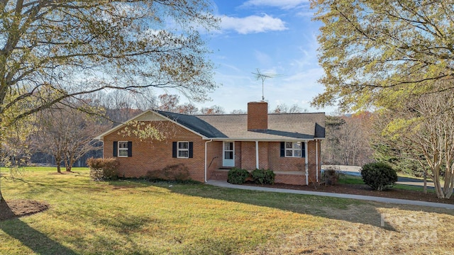 ranch-style house featuring a front lawn