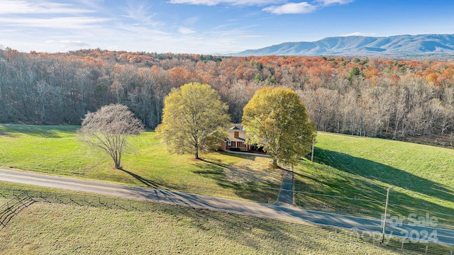 mountain view featuring a rural view