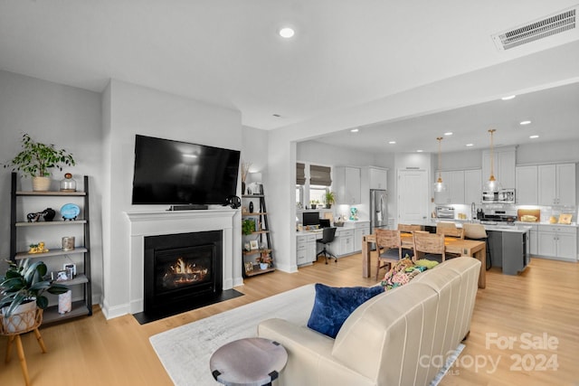 living room with light wood-type flooring