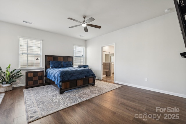 bedroom with connected bathroom, ceiling fan, and hardwood / wood-style floors