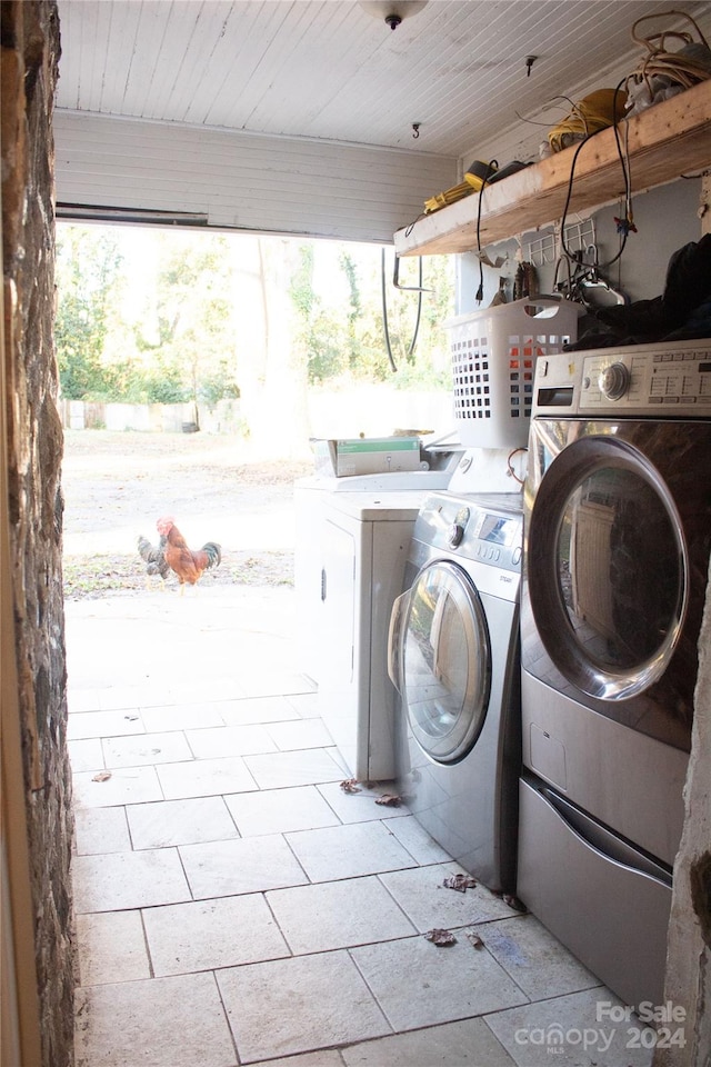 washroom with separate washer and dryer and wood ceiling