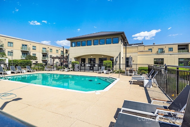 view of pool featuring a patio area