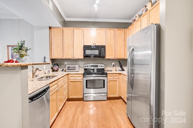 kitchen with light brown cabinets, crown molding, sink, light wood-type flooring, and stainless steel appliances