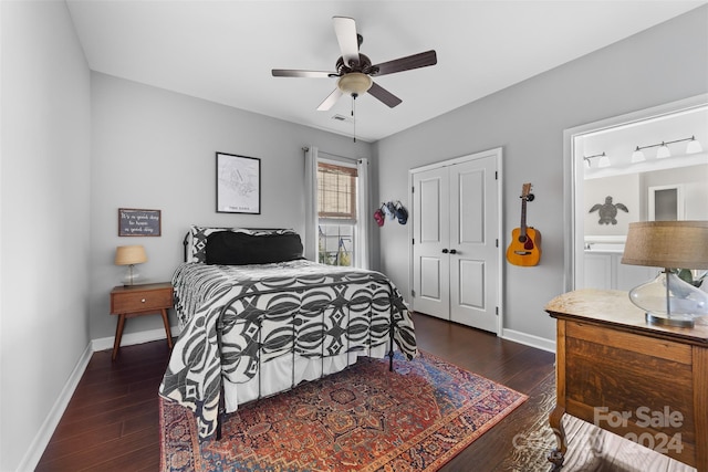 bedroom with ceiling fan, a closet, and dark hardwood / wood-style floors