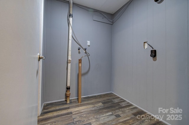 washroom with dark wood-type flooring