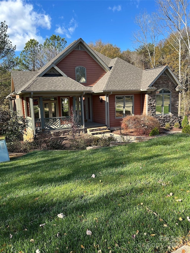 view of front of house featuring a porch and a front yard