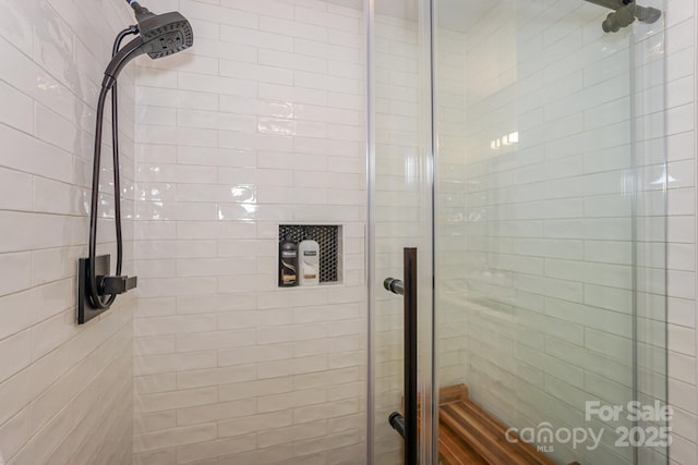 bathroom featuring a stall shower