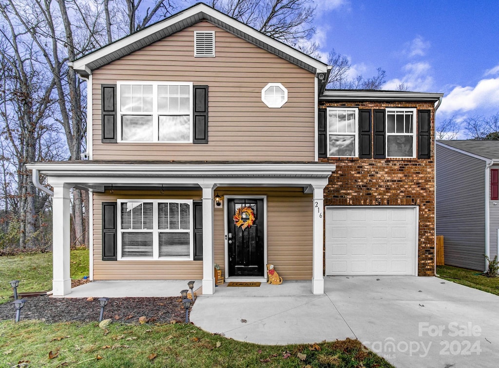 view of front property with a garage