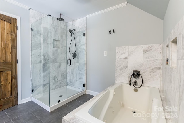 bathroom featuring tile patterned flooring, separate shower and tub, vaulted ceiling, and crown molding