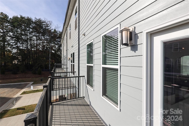 view of property exterior with a balcony