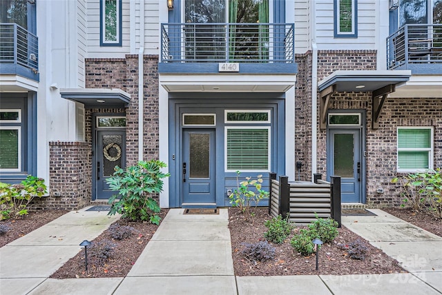 property entrance with a balcony