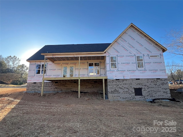 back of property with french doors