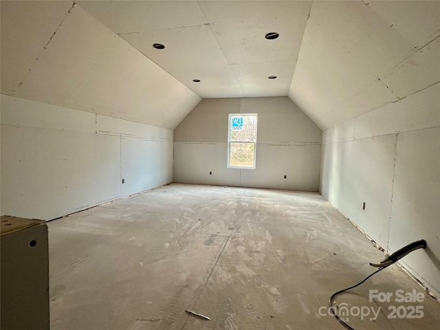 bonus room with vaulted ceiling