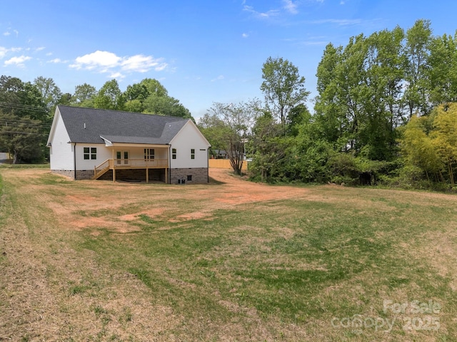 5037 Faith Rd, Salisbury, NC 28146 - view of grassy yard featuring stairway and a wooden deck