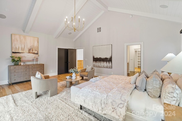 bedroom with beamed ceiling, high vaulted ceiling, light hardwood / wood-style flooring, and a notable chandelier