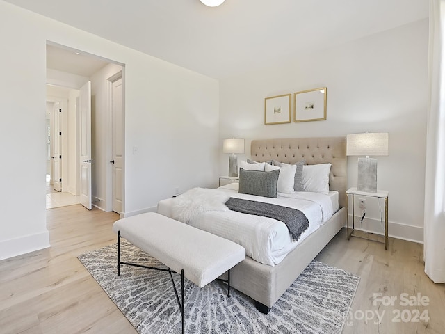 bedroom featuring light hardwood / wood-style flooring