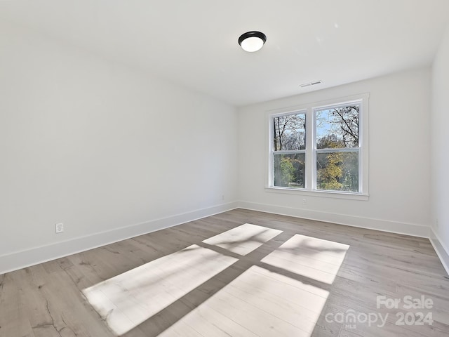 empty room featuring light wood-type flooring