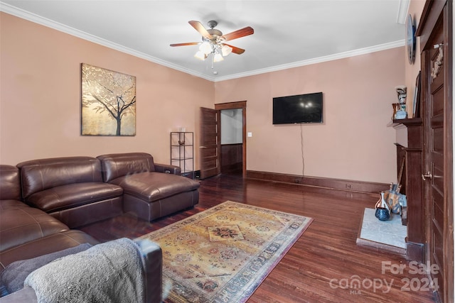 living room with ceiling fan, dark hardwood / wood-style flooring, and crown molding