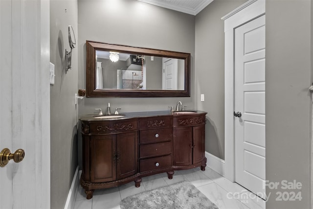 bathroom with vanity and crown molding