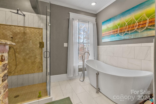 bathroom with tile patterned floors, ornamental molding, and independent shower and bath