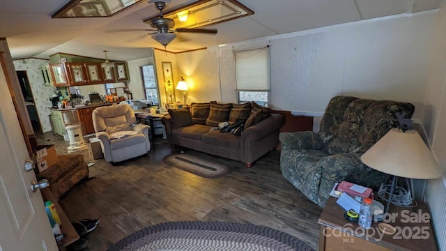 living room with lofted ceiling, wood finished floors, and ceiling fan