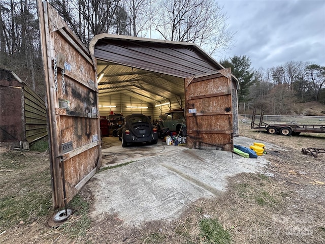 view of parking / parking lot featuring a carport and driveway