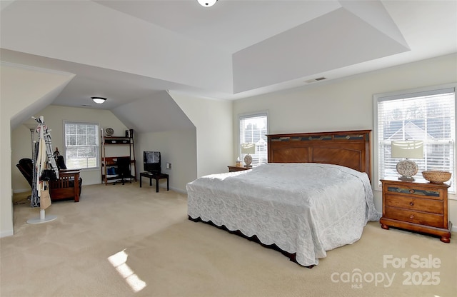 bedroom featuring light colored carpet