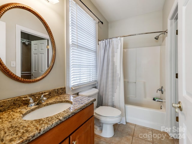 full bathroom featuring tile patterned flooring, shower / bath combination with curtain, toilet, and vanity