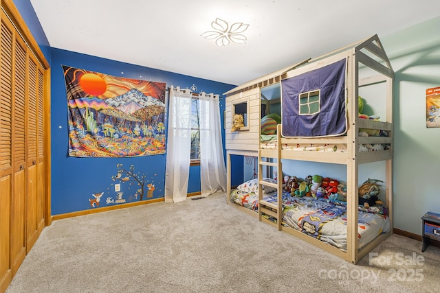 bedroom featuring carpet flooring and a closet