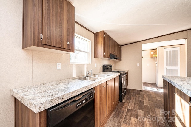 kitchen featuring sink, crown molding, black appliances, dark hardwood / wood-style flooring, and vaulted ceiling