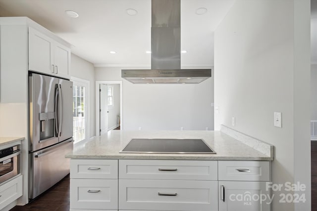 kitchen featuring island range hood, light stone countertops, white cabinetry, and stainless steel appliances