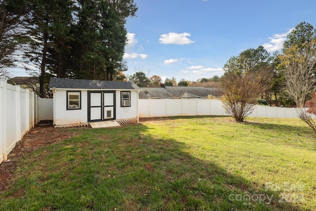 view of yard featuring a storage unit