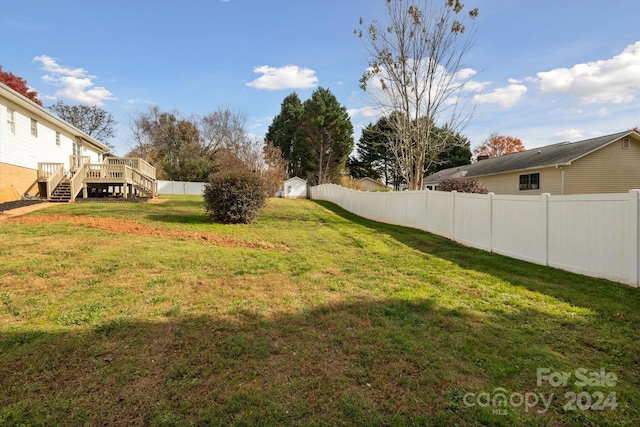 view of yard with a deck