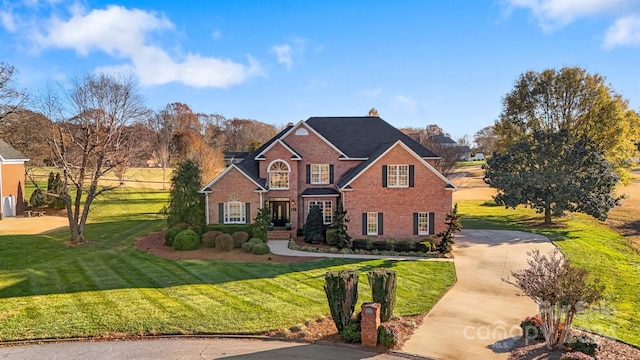 view of front of house with a front lawn