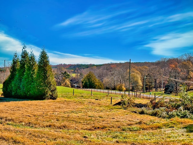 view of mountain feature with a rural view