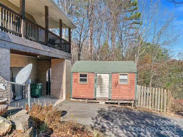 view of home's exterior featuring a storage unit