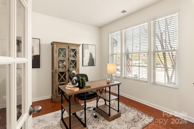 office area featuring french doors and dark wood-type flooring