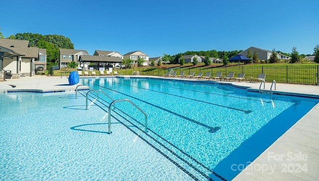 view of swimming pool featuring a patio