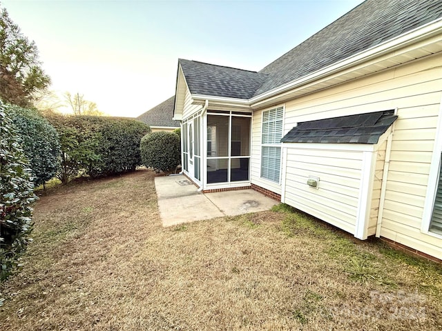 exterior space featuring a sunroom